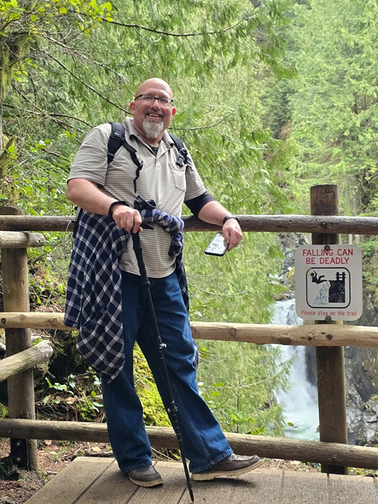 Big Al posing for a picture in the forest